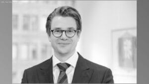 Porträt des Autors Prof. Dr. med. Samuel Huber, Direktor der I. Medizinischen Klinik und Poliklinik, Leiter der Sektion molekulare Gastroenterologie und Immunologie.